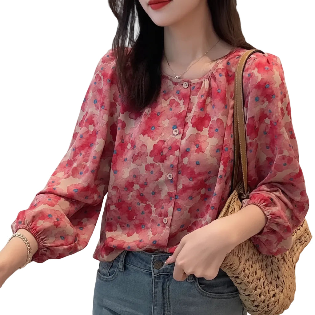 Stilvolle Bluse mit Laternenärmeln und floralem Muster